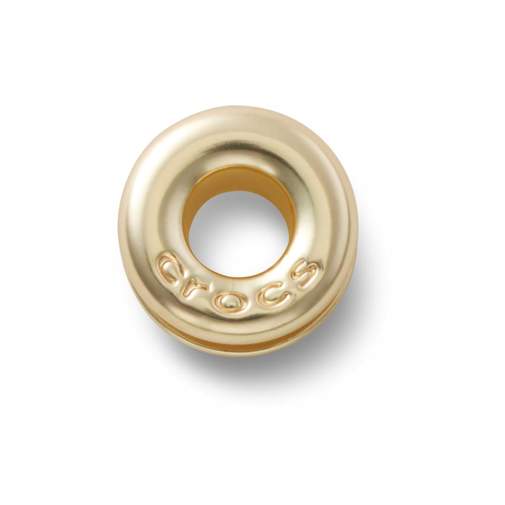 Jibbitz™ Ilhó Dourado UNICO